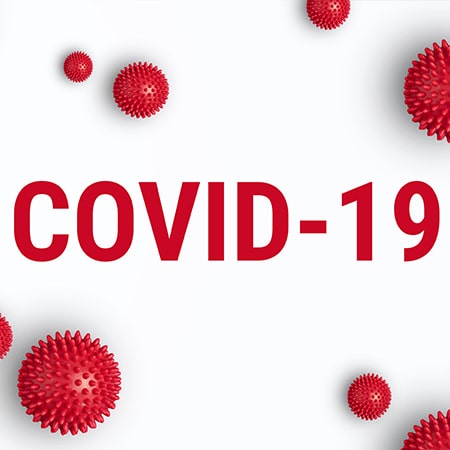 scritta Covid-19 su sfondo bianco con immagini molecole virus